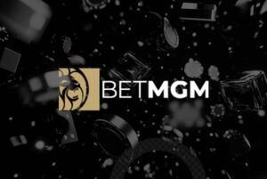 logo da betmgm com fundo preto e fichas de cassino